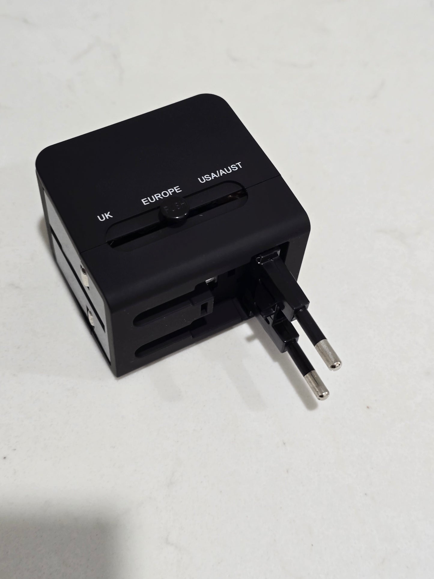 Ramadan multi nation travel adapter with usb charger